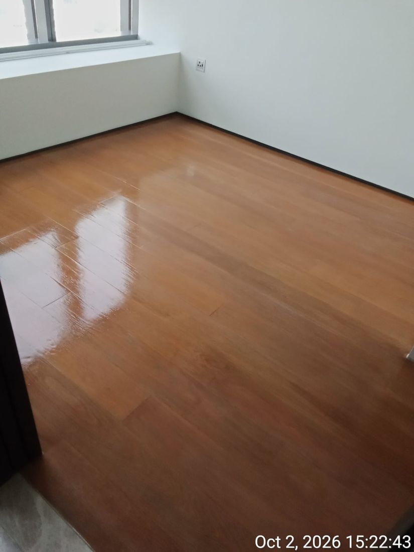 Strip parquet after gloss varnish reflecting the window