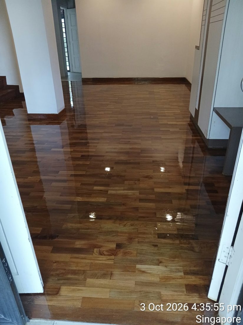 Landed home living room strip parquet with a high-gloss finish
